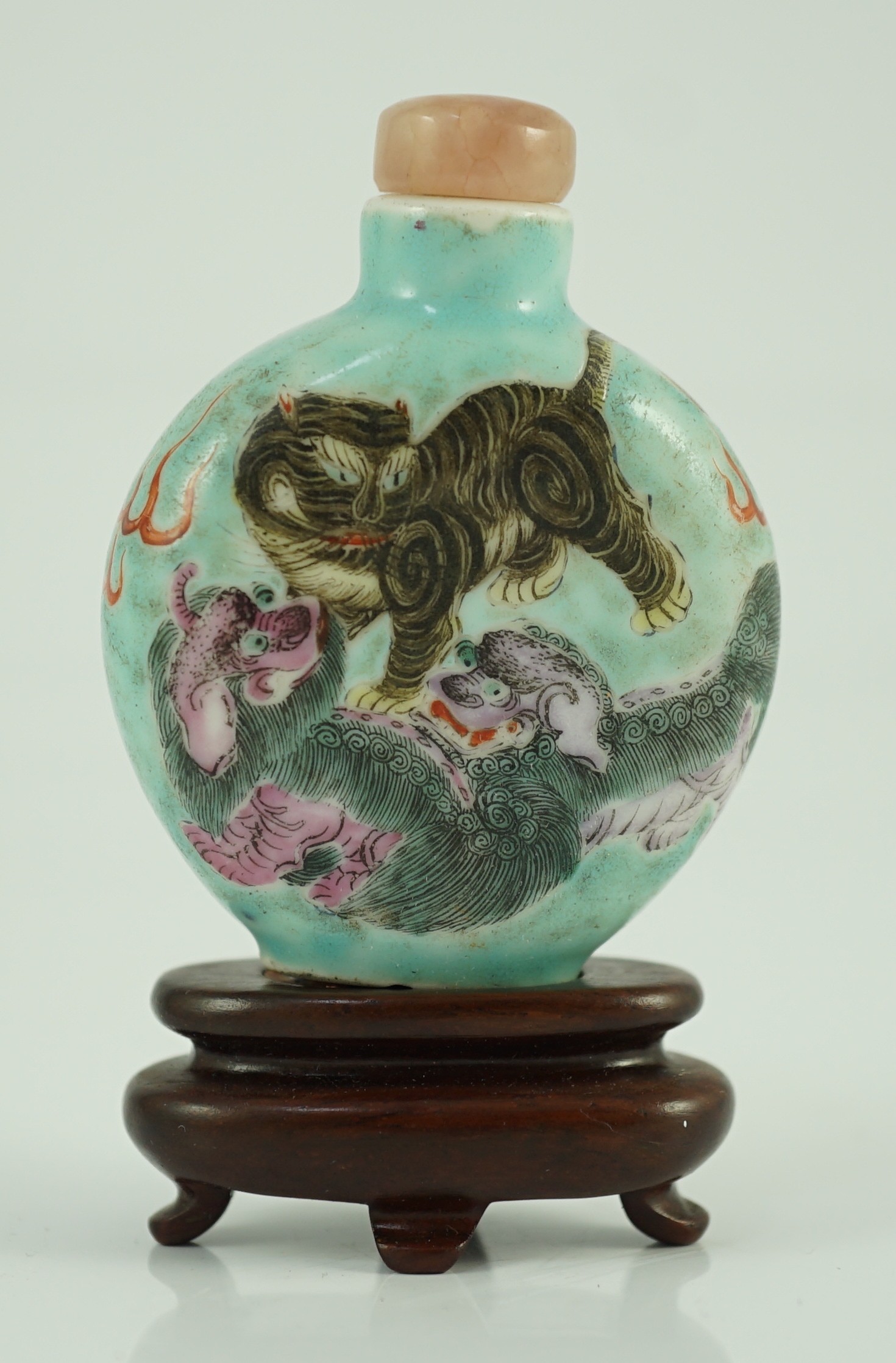 A Chinese enamelled porcelain ‘mythical beasts’ snuff bottle, 1850-1900, 5.6cm, splinter chips to foot